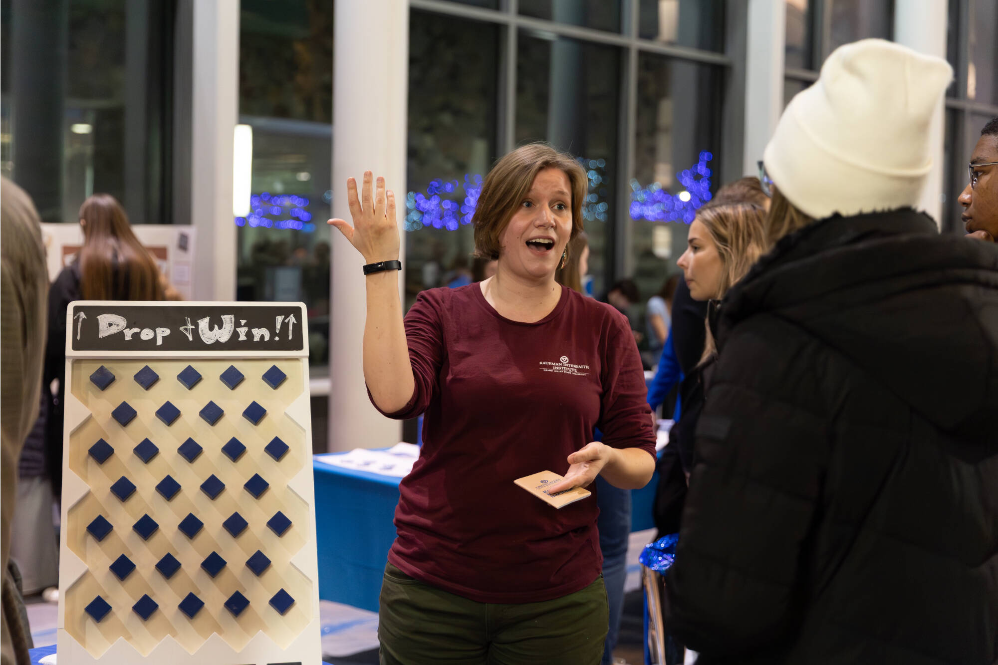 Kaufman Interfaith staff talking with a student